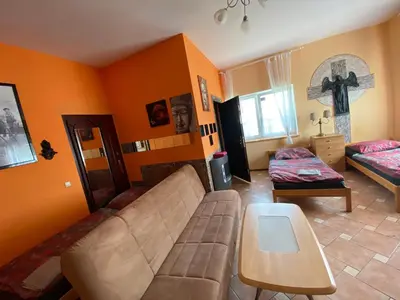 Ein Bett oder Betten in einem Zimmer der Unterkunft Pension SXF