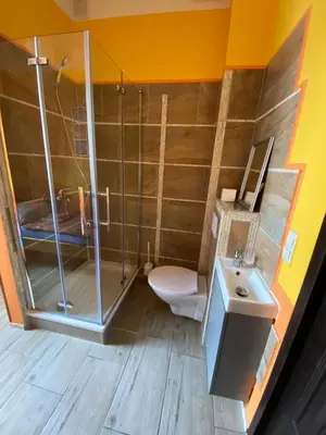 Ein Badezimmer in der Unterkunft Pension SXF