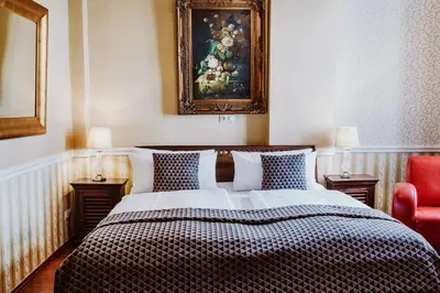 Ein Bett oder Betten in einem Zimmer der Unterkunft Honigmond Boutique Hotel