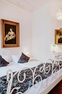 Ein Bett oder Betten in einem Zimmer der Unterkunft Honigmond Boutique Hotel