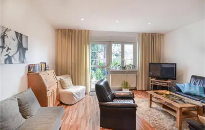 Ein Sitzbereich in der Unterkunft Ferienhaus Altenescher Weg J