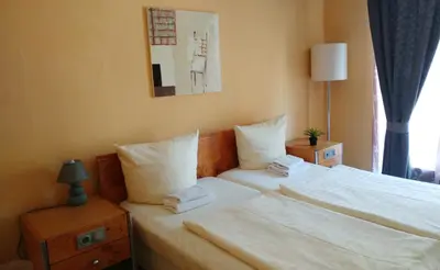Ein Bett oder Betten in einem Zimmer der Unterkunft Hotel M68