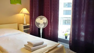 Ein Bett oder Betten in einem Zimmer der Unterkunft Hotel M68
