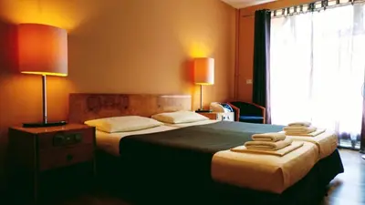 Ein Bett oder Betten in einem Zimmer der Unterkunft Hotel M68