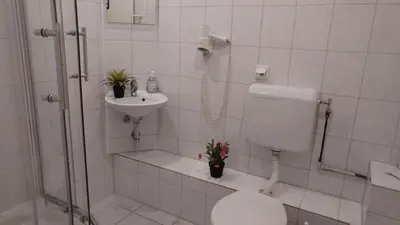 Ein Badezimmer in der Unterkunft Hotel M68