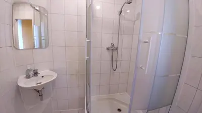 Ein Badezimmer in der Unterkunft Hotel M68
