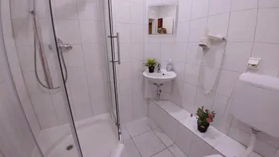 Ein Badezimmer in der Unterkunft Hotel M68