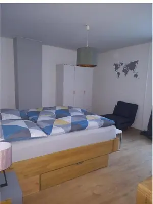 Ein Bett oder Betten in einem Zimmer der Unterkunft FeWo Marie Magdalena