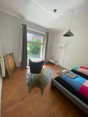 Ein Bett oder Betten in einem Zimmer der Unterkunft Osthafen I