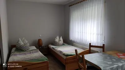 Ein Bett oder Betten in einem Zimmer der Unterkunft Pension und Ferienwohnung Walther App. 2
