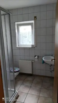 Ein Badezimmer in der Unterkunft Pension und Ferienwohnung Walther App. 2
