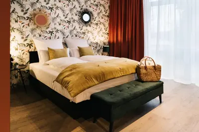 Ein Bett oder Betten in einem Zimmer der Unterkunft Landhaus am See - Gästezimmer
