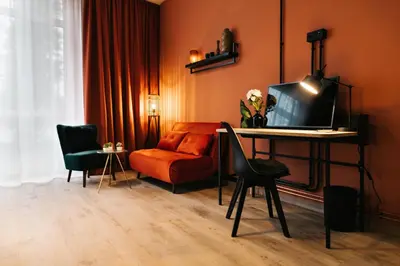 Ein Sitzbereich in der Unterkunft Landhaus am See - Gästezimmer