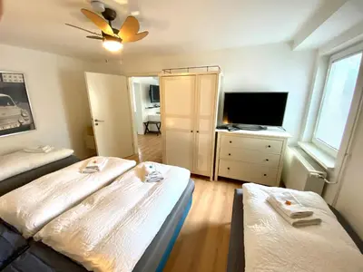 Ein Bett oder Betten in einem Zimmer der Unterkunft City Holiday Apartments Berlin