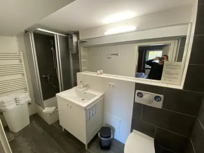 Ein Badezimmer in der Unterkunft City Holiday Apartments Berlin