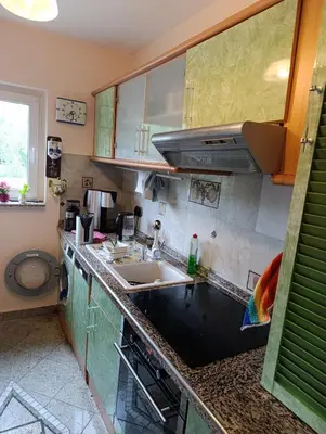 Küche/Küchenzeile in der Unterkunft Weltoffenes privates Gästezimmer bei LGBTQ freundlichen Gastgeber der mit in der Wohnung lebt
