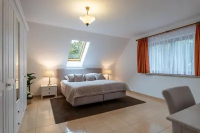 Ein Bett oder Betten in einem Zimmer der Unterkunft Ferienwohnung im grünen Mühlenbeck-nahe Berlin