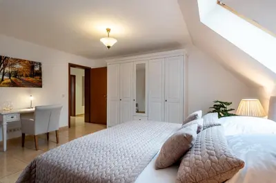 Ein Bett oder Betten in einem Zimmer der Unterkunft Ferienwohnung im grünen Mühlenbeck-nahe Berlin