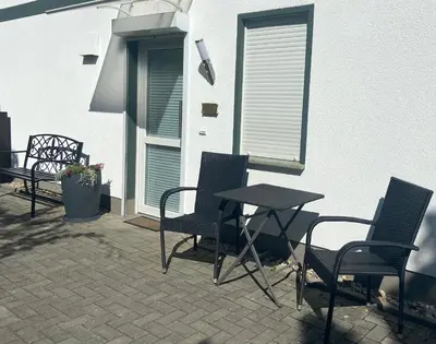 Ein Balkon oder eine Terrasse in der Unterkunft FeWo-Airport