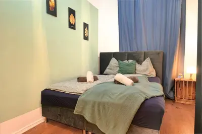 Ein Bett oder Betten in einem Zimmer der Unterkunft Blue Chili 13 - Nur ein Katzensprung in die City - bis 8 Pers