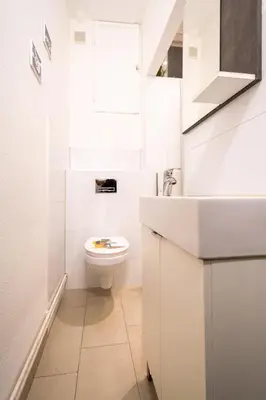 Ein Badezimmer in der Unterkunft Blue Chili 13 - Nur ein Katzensprung in die City - bis 8 Pers