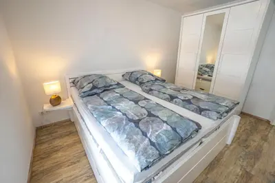 Ein Bett oder Betten in einem Zimmer der Unterkunft Hirtenhaus 28b Erdgeschoss