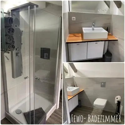 Ein Badezimmer in der Unterkunft FEWO Hoppegarten