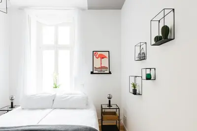 Ein Bett oder Betten in einem Zimmer der Unterkunft 4-Zi Urban Design 120m² BRANDNEW 200Mbit