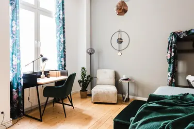 Ein Bett oder Betten in einem Zimmer der Unterkunft 4-Zi Urban Design 120m² BRANDNEW 200Mbit