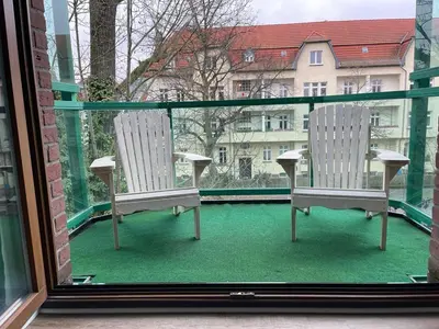 Ein Balkon oder eine Terrasse in der Unterkunft COSY PANKOW HOMES - Studios mit TV Stick