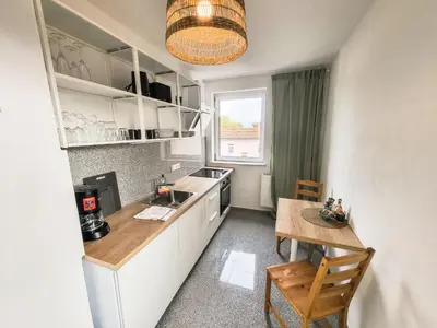 Küche/Küchenzeile in der Unterkunft BetterBeds Brandenburg