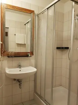 Ein Badezimmer in der Unterkunft Ritterhof Kampehl
