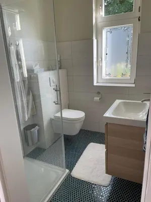 Ein Badezimmer in der Unterkunft Ferienwohnungen an der Stadtvilla Rheinsberg