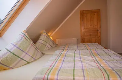 Ein Bett oder Betten in einem Zimmer der Unterkunft Ferienwohnung Schmidt in Altglobsow