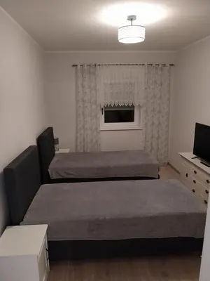 Ein Bett oder Betten in einem Zimmer der Unterkunft Ferienwohnung Lindenblick
