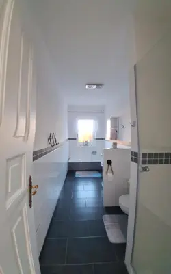 Ein Bett oder Betten in einem Zimmer der Unterkunft Ferienwohnung Lindenblick