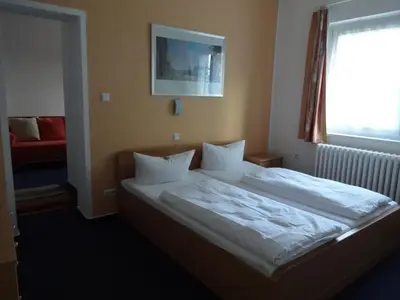 Ein Bett oder Betten in einem Zimmer der Unterkunft Hotel Süden