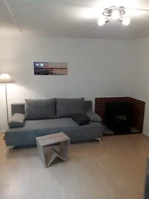 Ein Sitzbereich in der Unterkunft Ferienhaus am Langen See III