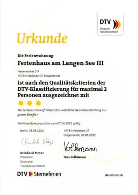 Ein Zertifikat, Auszeichnung, Logo oder anderes Dokument, das in der Unterkunft Ferienhaus am Langen See III ausgestellt ist