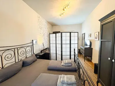 Ein Bett oder Betten in einem Zimmer der Unterkunft Nap Club - stylish & quiet base in vibrant Kiez