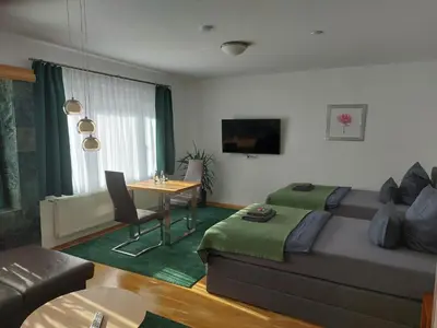 Ein Sitzbereich in der Unterkunft Ferienwohnung 