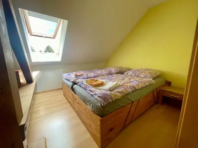 Ein Bett oder Betten in einem Zimmer der Unterkunft Biesdorf-verkehrsgünstig und ruhig