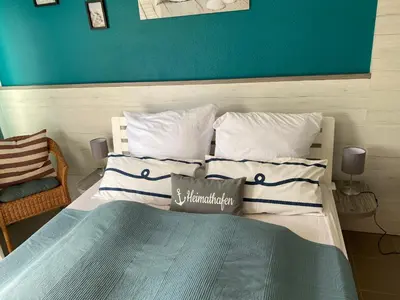 Ein Bett oder Betten in einem Zimmer der Unterkunft Pension Wernicke-Das-Original
