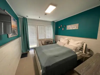 Ein Bett oder Betten in einem Zimmer der Unterkunft Pension Wernicke-Das-Original
