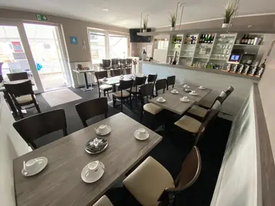 Ein Restaurant oder anderes Speiselokal in der Unterkunft Pension Wernicke-Das-Original