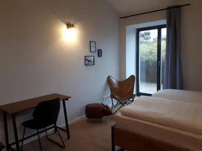 Ein Bett oder Betten in einem Zimmer der Unterkunft Pension in der Alten Mälzerei