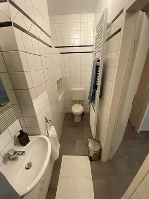 Ein Badezimmer in der Unterkunft Apartment Glasower 31