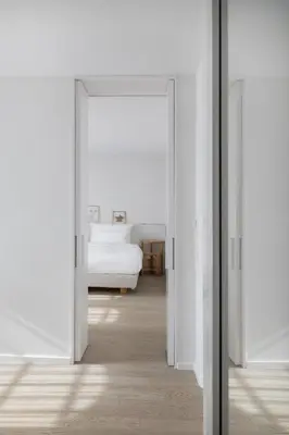 Ein Bett oder Betten in einem Zimmer der Unterkunft Wilmina Hotel