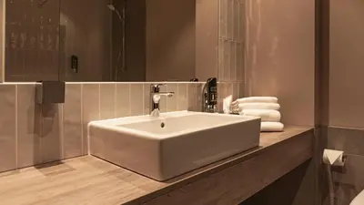 Ein Badezimmer in der Unterkunft H24 Stadthotel Bernau