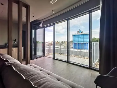 Ein Sitzbereich in der Unterkunft H24 Stadthotel Bernau